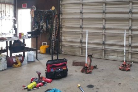 Tools and equipment used for commercial garage door replacement in Lakeway workshop