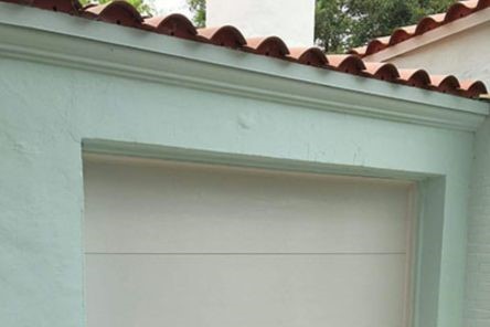 Close-up view of new garage door installation, showing seamless fit and updated design.